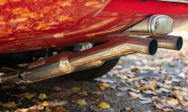 A flaming red Jaguar E-Type 4.2 Spider