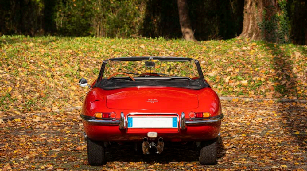 A flaming red Jaguar E-Type 4.2 Spider