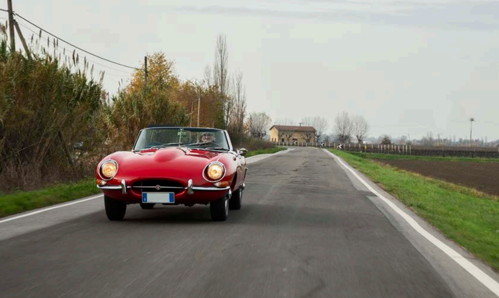 A flaming red Jaguar E-Type 4.2 Spider