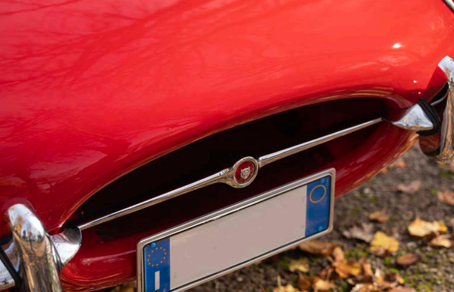 A flaming red Jaguar E-Type 4.2 Spider
