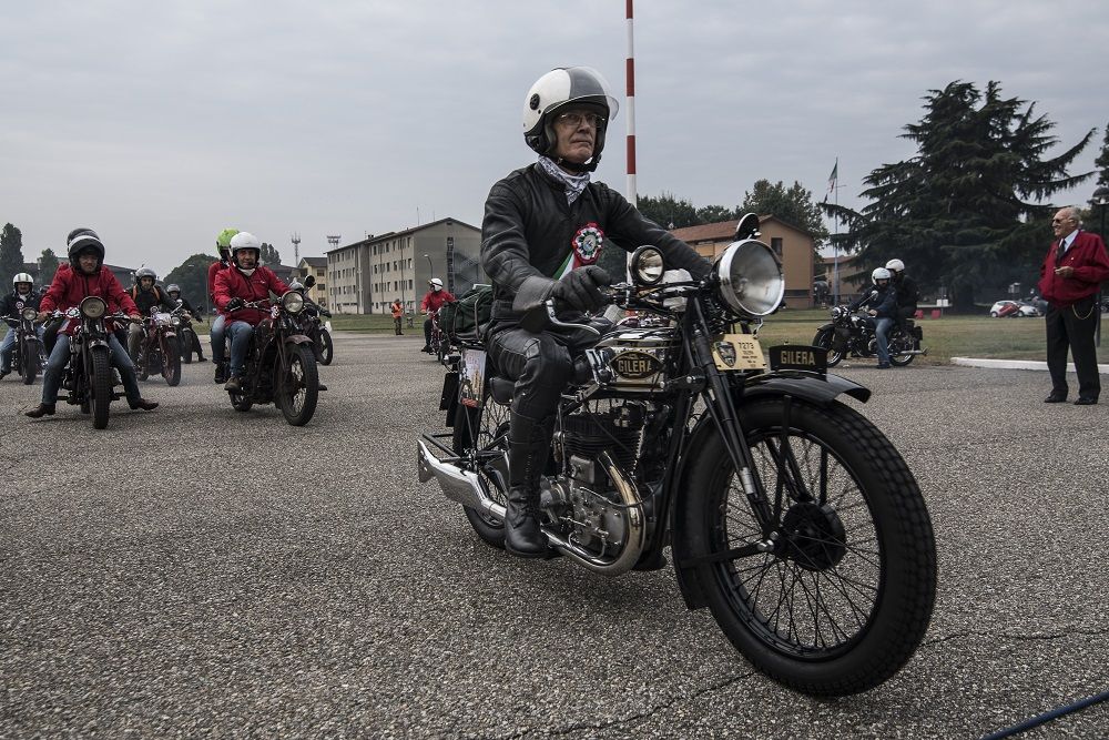 The vintage cars and motorcycles of the Milan Trophy ready for a new fashion show at Castello Sforzesco. Launch of the 13th Edition organized by the C