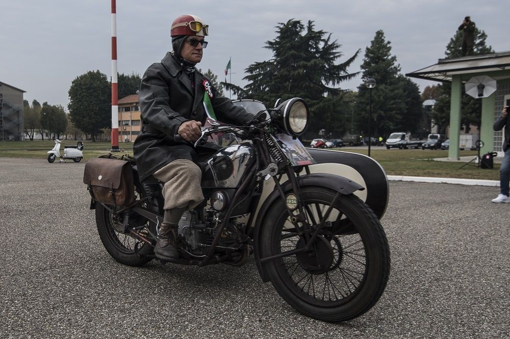 The vintage cars and motorcycles of the Milan Trophy ready for a new fashion show at Castello Sforzesco. Launch of the 13th Edition organized by the C