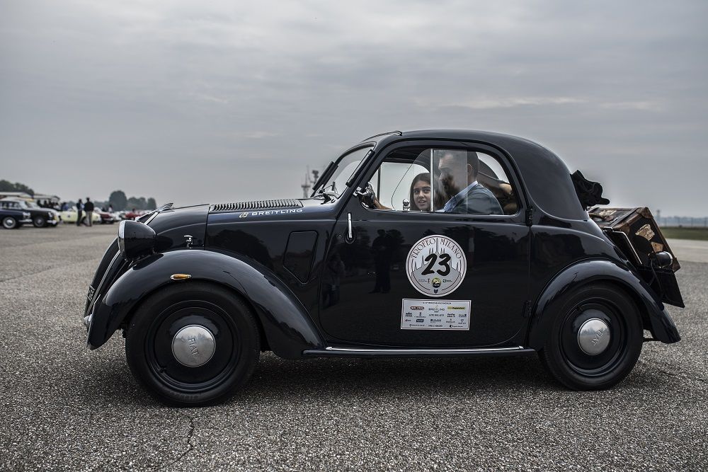 The vintage cars and motorcycles of the Milan Trophy ready for a new fashion show at Castello Sforzesco. Launch of the 13th Edition organized by the C