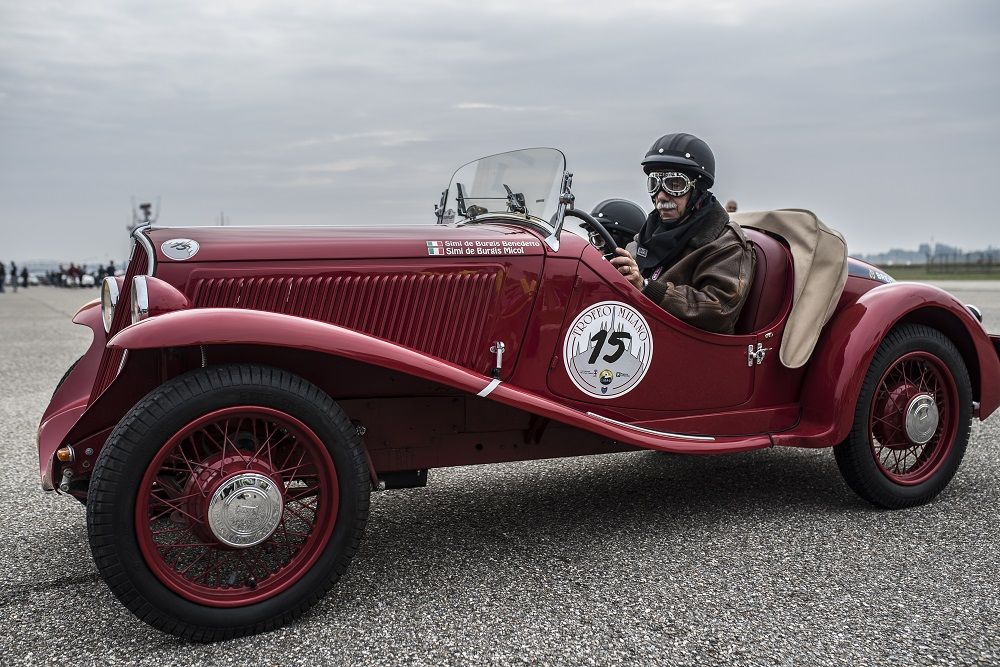 The vintage cars and motorcycles of the Milan Trophy ready for a new fashion show at Castello Sforzesco. Launch of the 13th Edition organized by the C