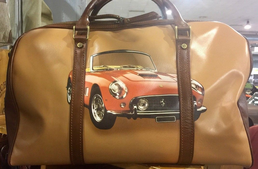 What does the exhibition Auto Moto d'Epoca Bologna offer to fans of original design, all things vintage and impeccable craftsmanship?